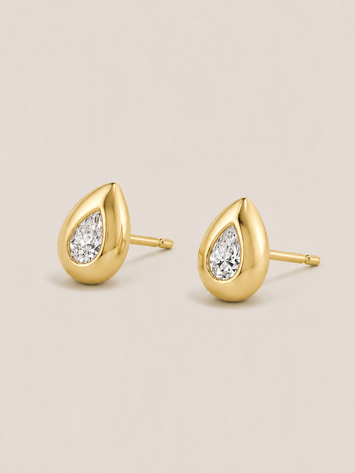 Pear Brilliant Cut Bezel Solitaire Studs — 14K Yellow Gold