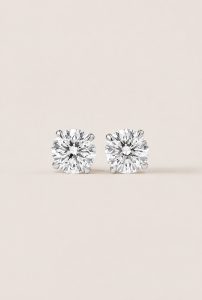 Timeless Round Brilliant Cut Solitaire Stud Earrings — 14K White Gold