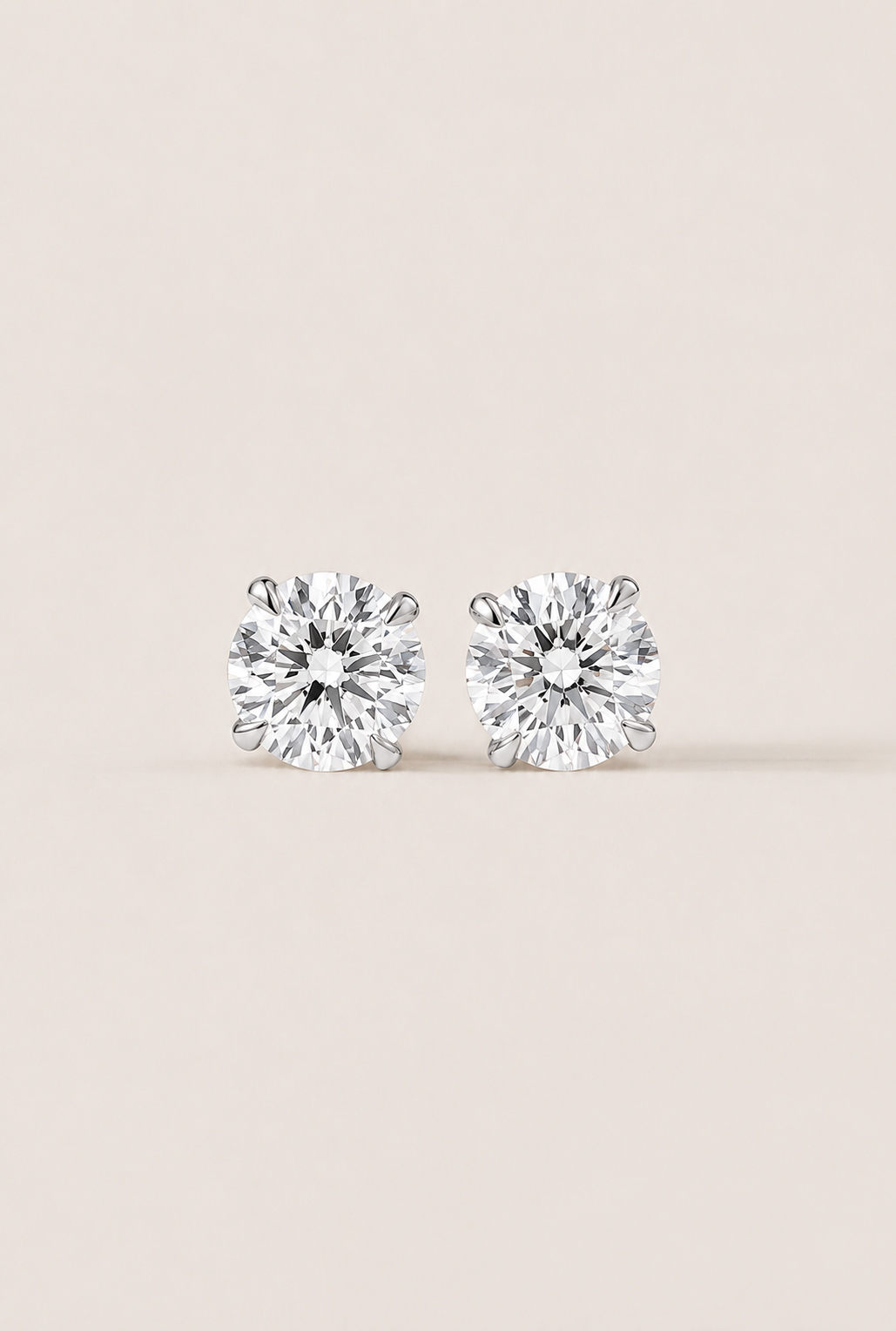 Timeless Round Brilliant Cut Solitaire Stud Earrings — 14K White Gold